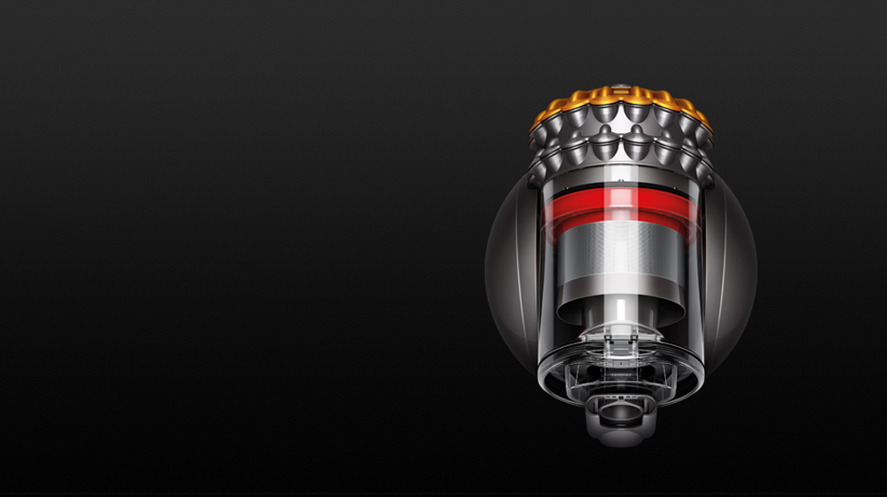 L’aspirateur Dyson Big Ball se redresse quand il se renverse  et éjecte hygiéniquement la poussière.